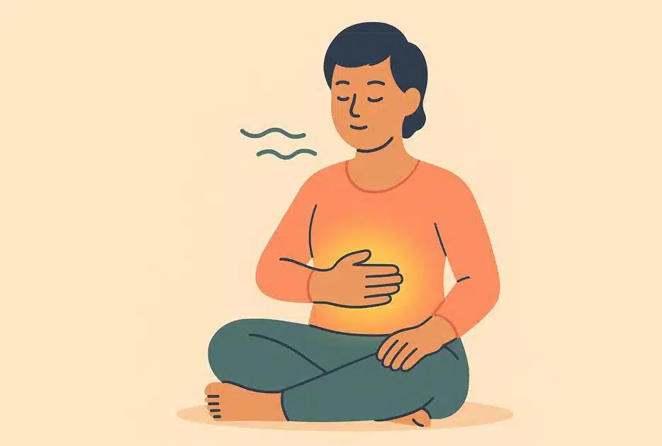 La persona practica la respiración abdominal con la mano en el plexo solar, visualiza la luz amarilla, simboliza la reducción del estrés